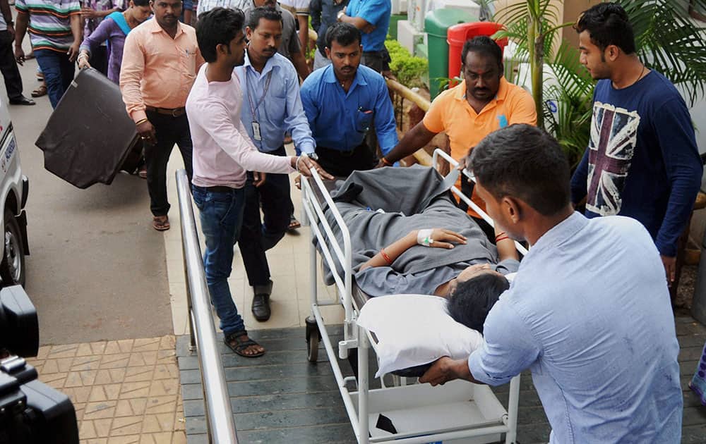 Patients being re-shifted to SUM hospital fire where a fire broke out yesterday night, in Bhubaneswar