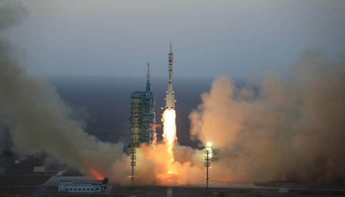Chinese manned space mission docks with space station