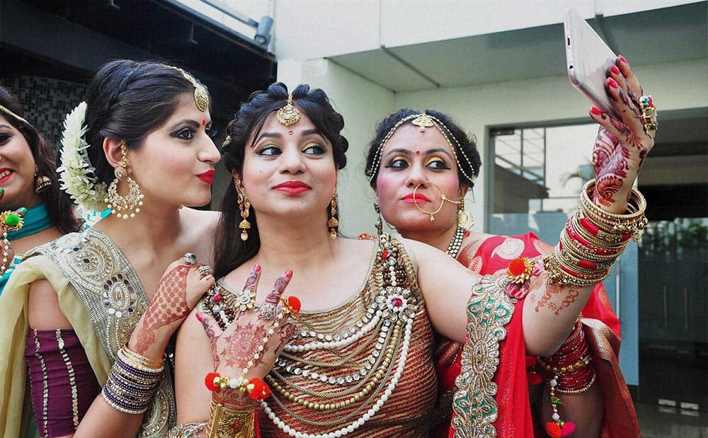 Married Women pose for a selfie during the Karva Chauth celebrations