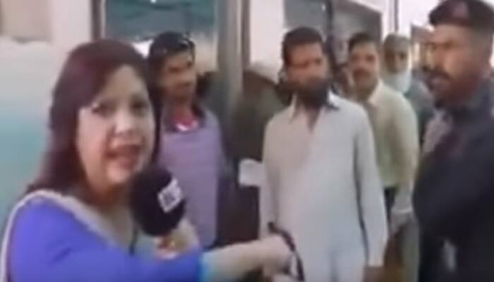 OMG! Pakistani cop attacks female journalist in full public glare while reporting – Watch viral video