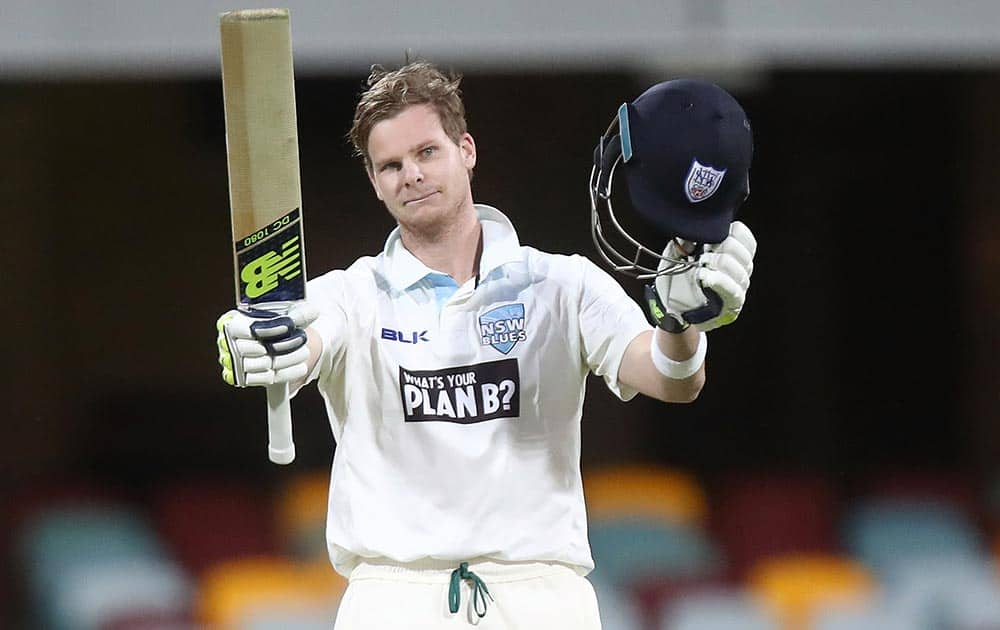 Steve Smith of the Blues celebrates his century