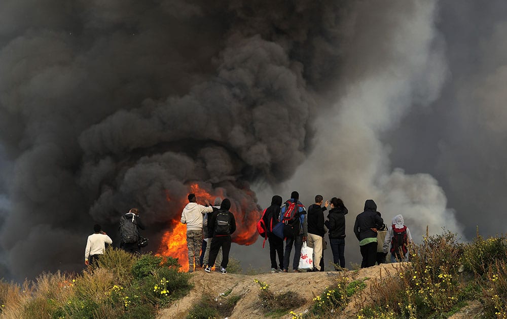 Migrants Leave The Jungle Refugee Camp In Calais