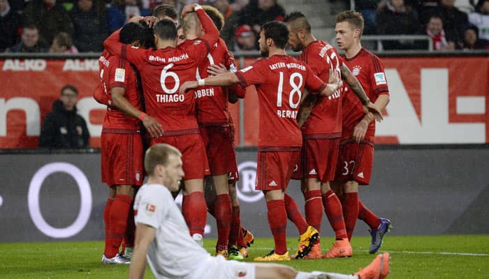 DFB Pokal: Holders Bayern Munich outmuscle Augsburg, Borussia Dortmund progress on penalties