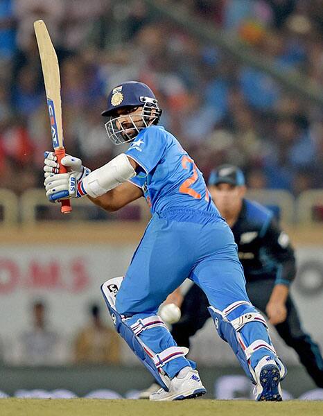 Ajinkya Rahane plays a shot during the 4th ODI