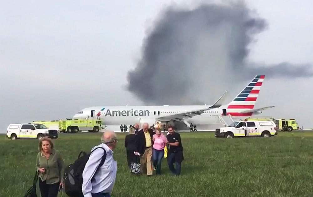 burning American Airlines jet that aborted takeoff and caught fire on the runway