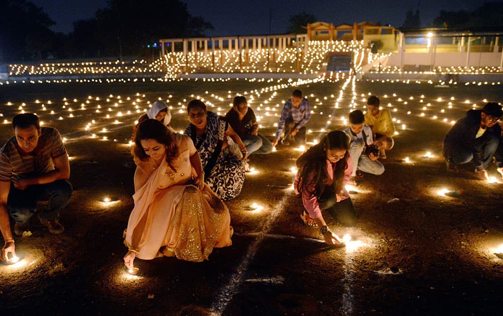 People light earthen lamps Diyas for soldiers on the occasion of Diwali Festival in Jabalpur