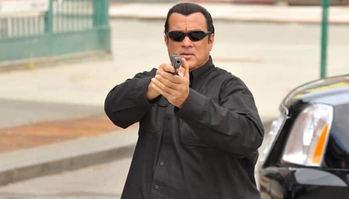 Vladimir Putin grants Steven Seagal Russian citizenship