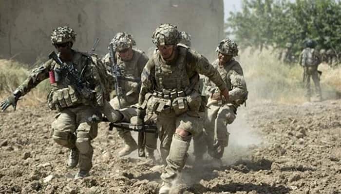 Two US military personnel, 16 Afghans killed in clash, police say