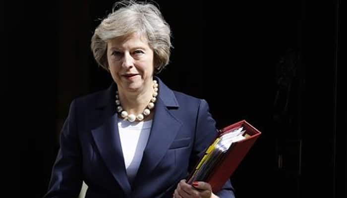 British PM Theresa May says values judiciary independence, press freedom