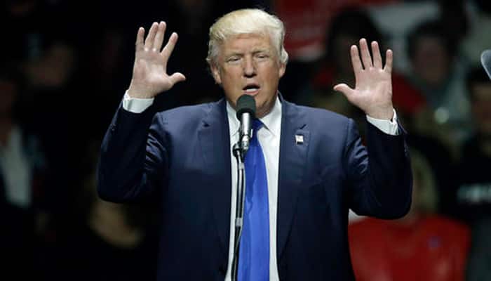 Will suspend Syrian refugee program if elected, says Donald Trump