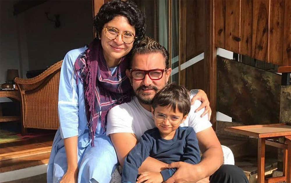 filmfare#AamirKhan, #KiranRao & cutie patootie... #AzadRaoKhan snuggle up before cutting birthday girl Kiran's cake. -Instagram filmfare#AamirKhan, #KiranRao & cutie patootie... #AzadRaoKhan snuggle up before cutting birthday girl Kiran's cake. -Instagram