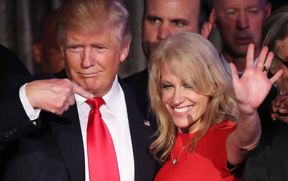 Republican president-elect Donald Trump along with his campaign manager Kellyanne Conway acknowledge the crowd