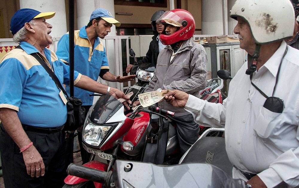 Rush being witnessed at a petrol pump after demonetizationof Rs 1000 and Rs 500 notes in New Delhi