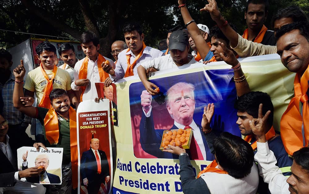 Activists of Hindu Sena celebrate the victory of US Republican presidential candidate Donald Trump in the presidential US elections, in New Delhi