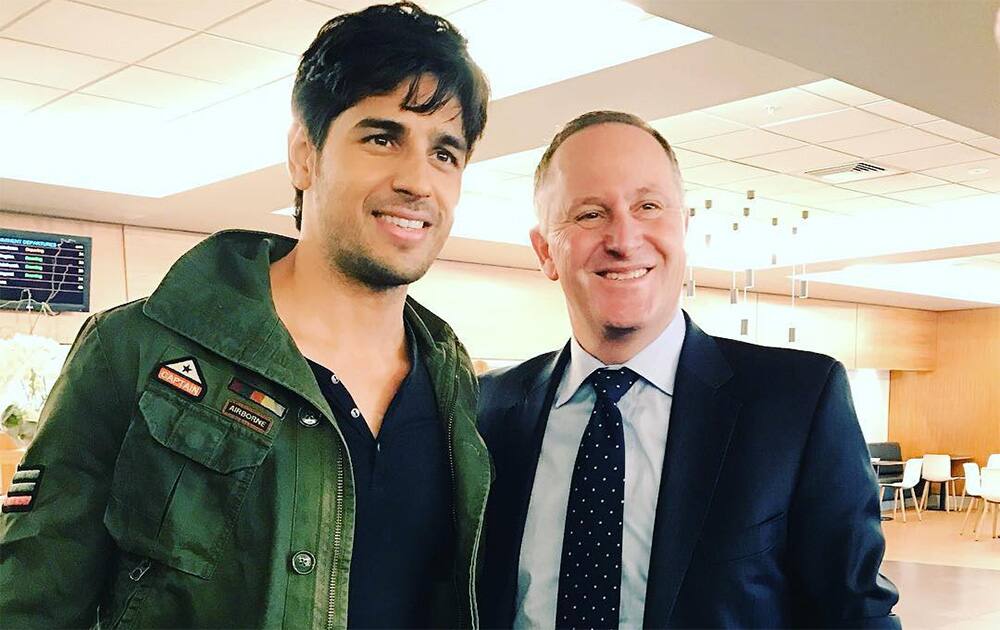 Sidharth Malhotra with New Zealand PM @johnkeypm at the #auckland airport