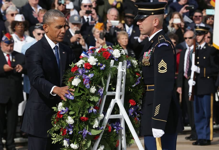 Barack Obama participates in a wreath-laying ceremony