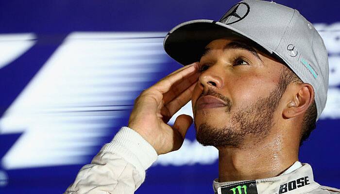 Brazilian Grand Prix: Lewis Hamilton edges past Nico Rosberg to claim pole position