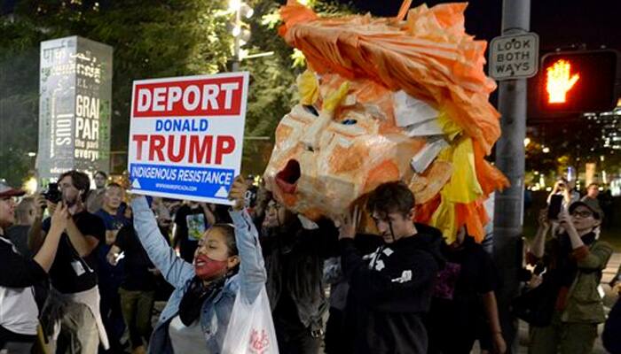 Thousands of US students carry protests against  Donald Trump into second week