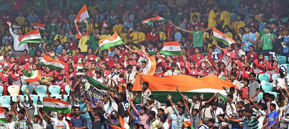 School children supporting the Indian cricket team during the 1st day of the 2nd Test cricket match against England in Visakhapatnam