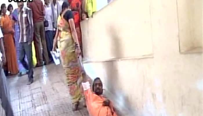 Wife drags ailing husband to first floor after Andhra Pradesh hospital denies stretcher 