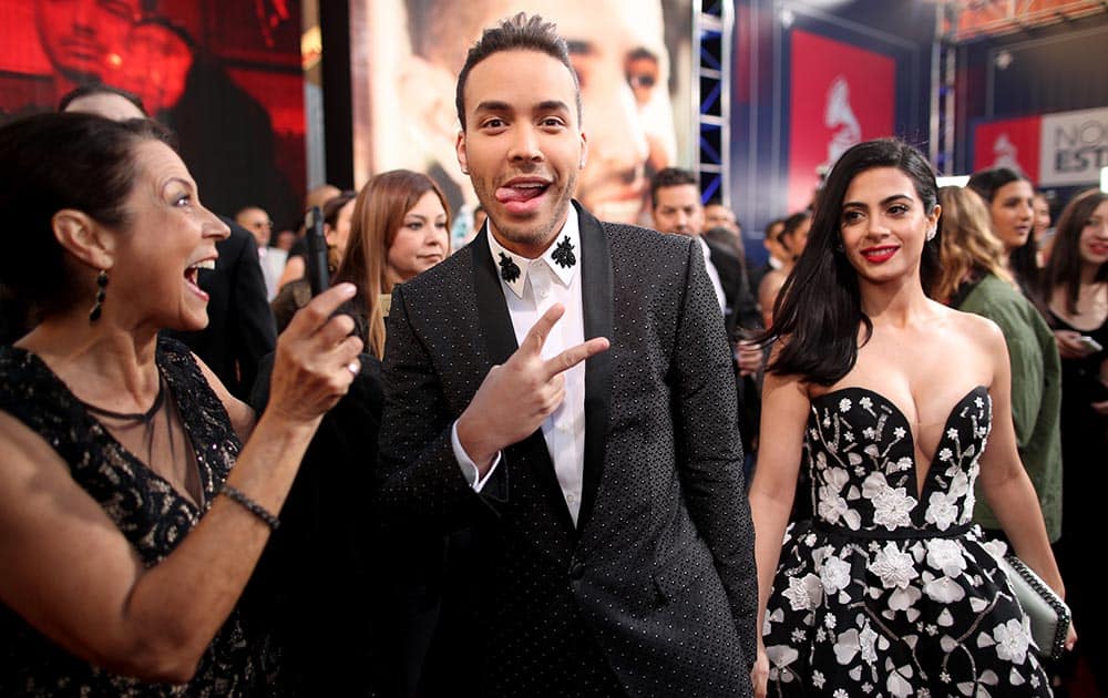 Recording artist Prince Royce (L) and actress Emeraude Toubia attend The 17th Annual Latin Grammy Awards