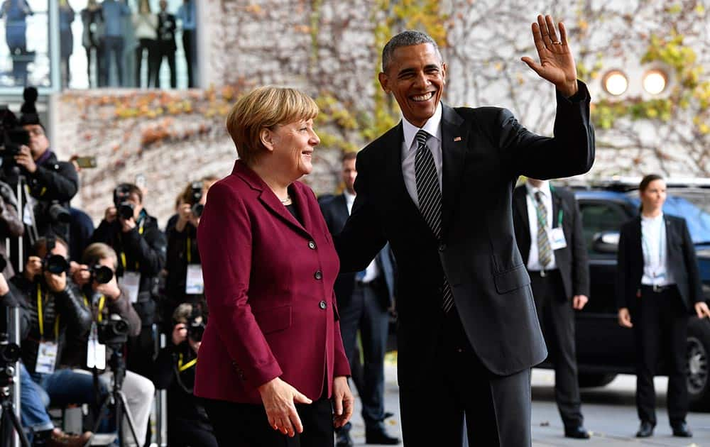 German Chancellor Angela Merkel greets US President Barack Obama