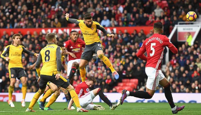 Premier League: Olivier Giroud sucker-punch earns Arsenal draw at Manchester United