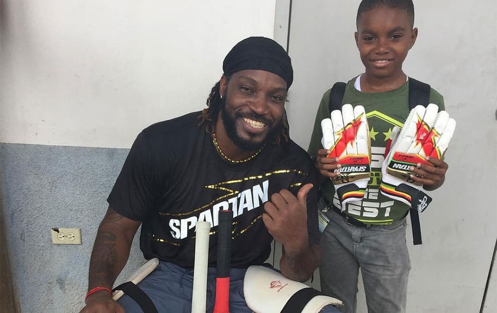 Chris Gayle :- Lucky youngster to get my gloves