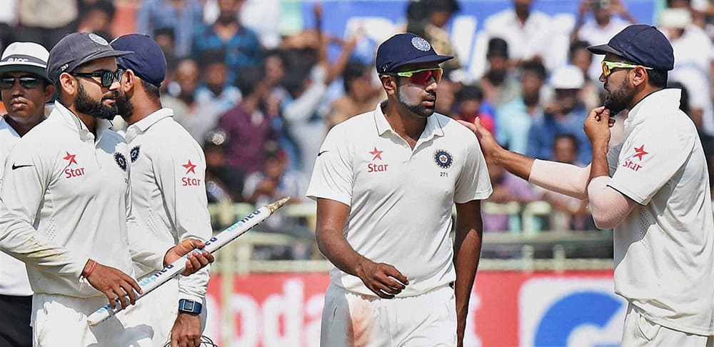 Virat Kohli along with team members following the victory against England on the last day of the 2nd Test match in Visakhapatnam