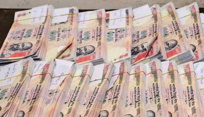 Government to distribute massive deposit bonanza to middle class, poor post demonetisation drive