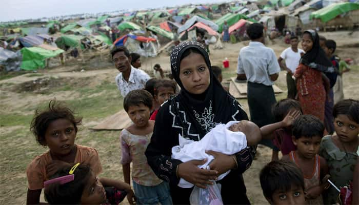 Thousands of Rohingya flee Myanmar violence