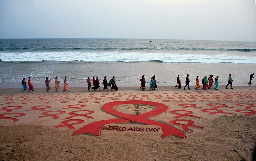 Sand art on the eve of World AIDS Day