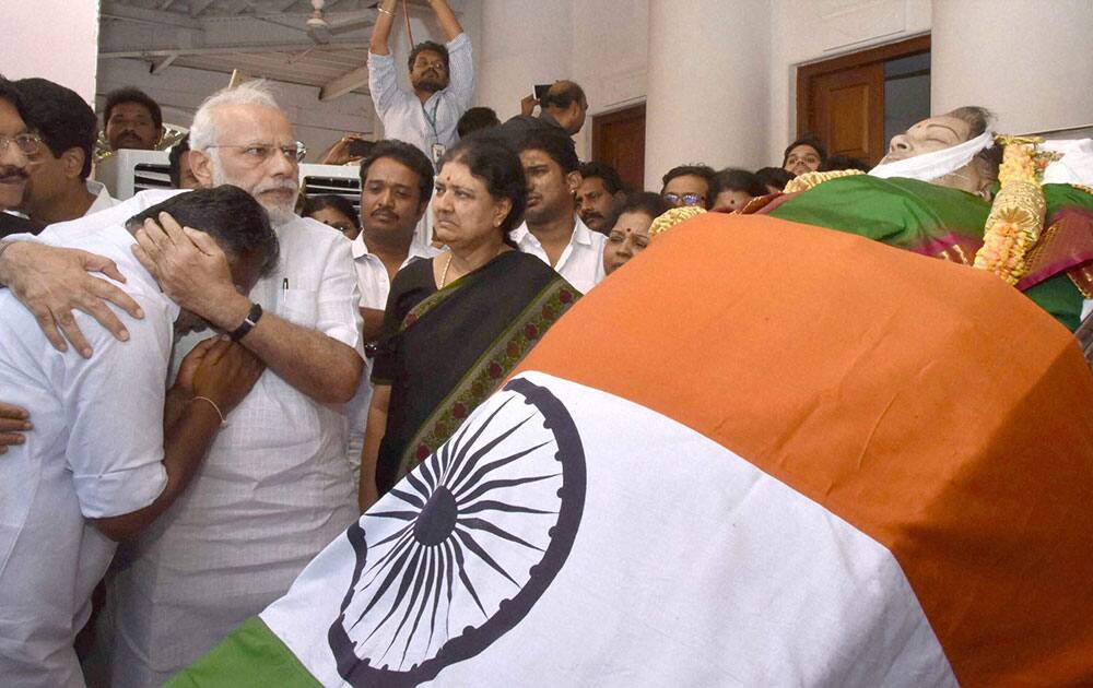 Prime Minister Narendra Modi consoles O Panneerselvam