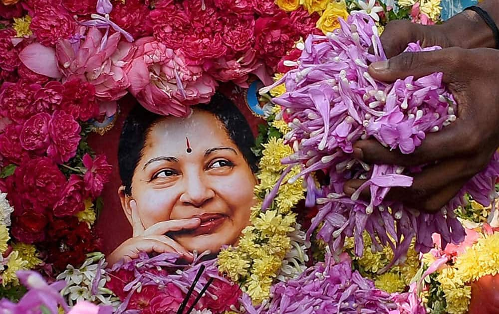 Supporters paying tribute to AIADMK leader J Jayalalithaa in Madurai