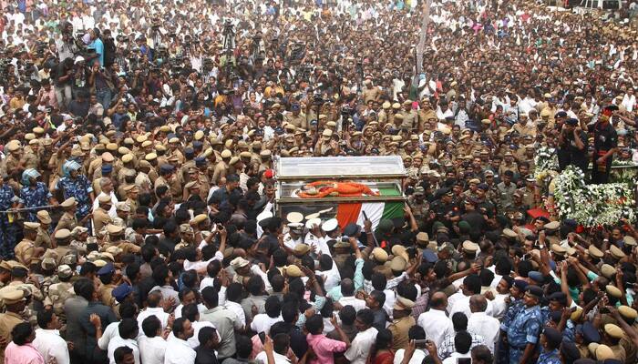 Jayalalithaa laid to rest near MGR Memorial in Chennai; thousands bid tearful adieu