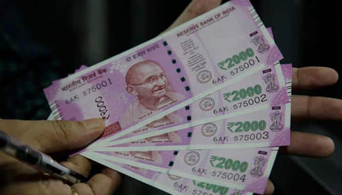 Rs 70 lakh in new currency seized in raids on postal official&#039;s kin in Hyderabad