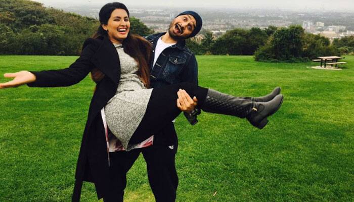 Geeta Basra, hubby Harbhajan Singh out on &#039;travel day&#039; with daughter