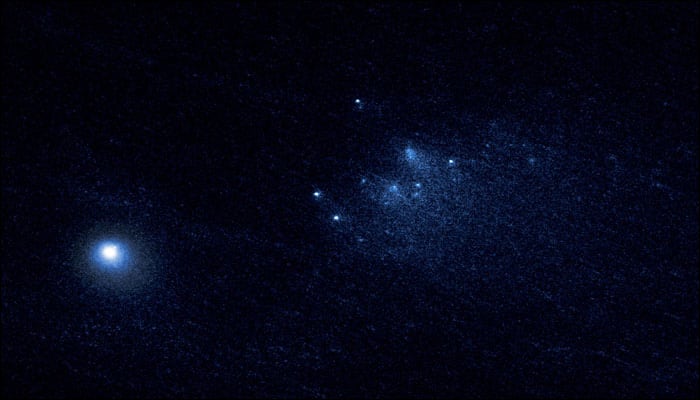 Picture perfect: Hubble clicks a comet breaking apart at just the right moment!