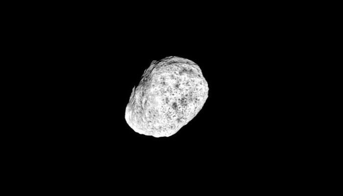 NASA's Cassini captures Saturn's small moon 'Hyperion' orbiting the planet in chaotic manner 