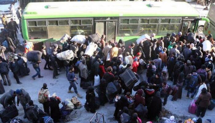 Aleppo evacuation: Thousands of trapped civilians and rebels in desperate wait for evacuation from opposition-held areas