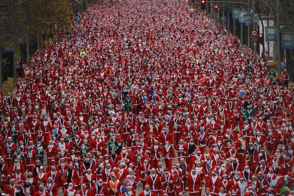 People dressed in Santa Claus