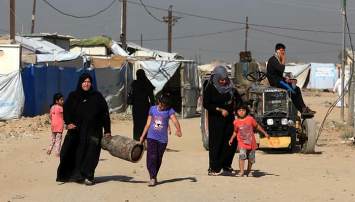 Mosul crisis: Iraqi civilians displace from Hassan Sham camp to recapture home under risky circumstances