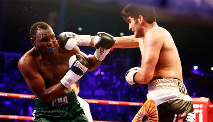WATCH: Vijender Singh&#039;s powerful right jab which forced Francis Cheka to retire hurt