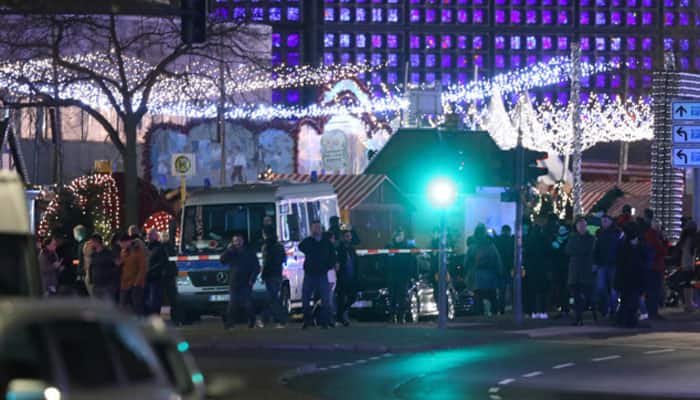 At least 12 dead as truck ploughs into crowd at Berlin Christmas market