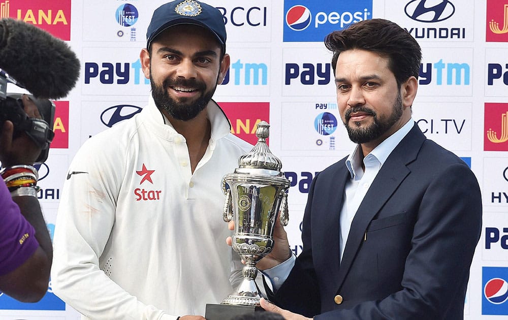 Virat Kohli recieved the winner trophy from BCCI President Anurag Thakur after winning the England test series