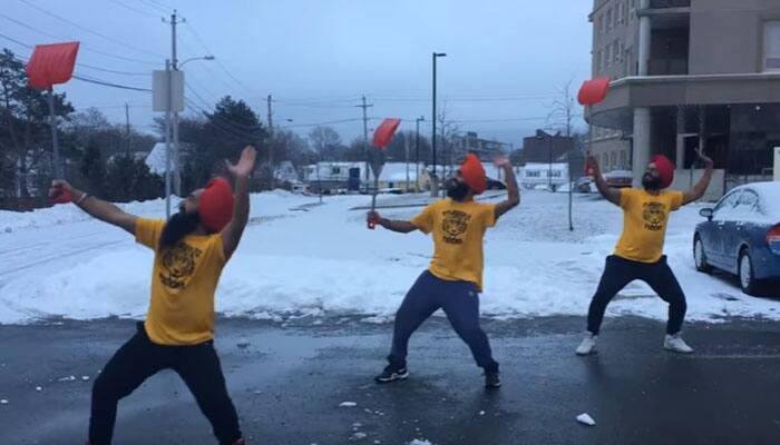 THIS Bhangra group in Canada removes snow in a unique way! 