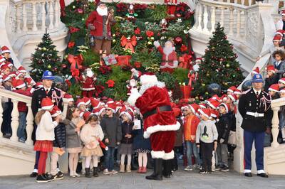 Children wait for Christmas gifts distribution