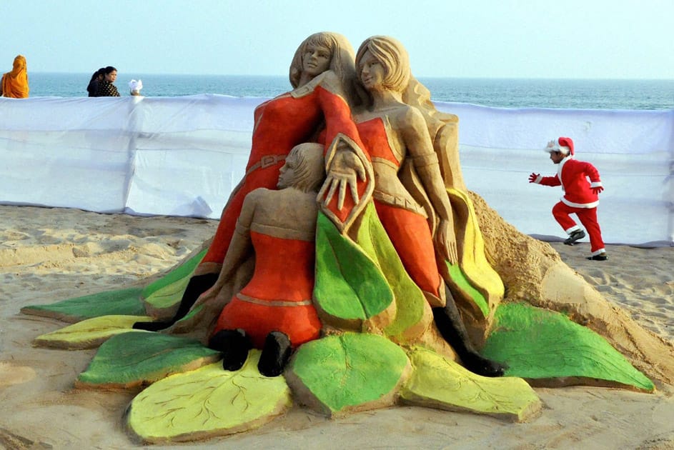 Sand artist Manas Sahoo creates a sand sculpture