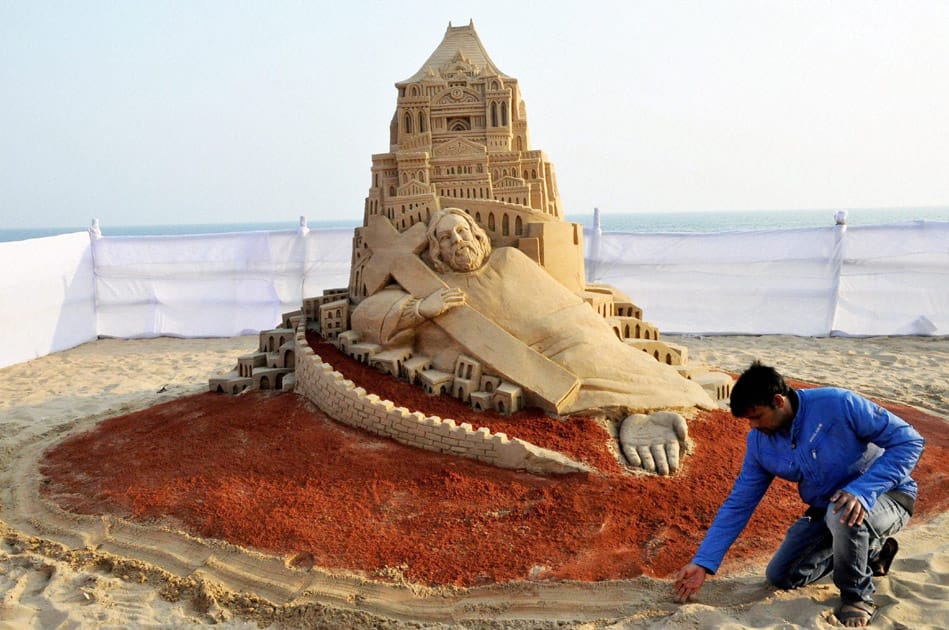 Sand artist Manas Sahoo creates a sand sculpture