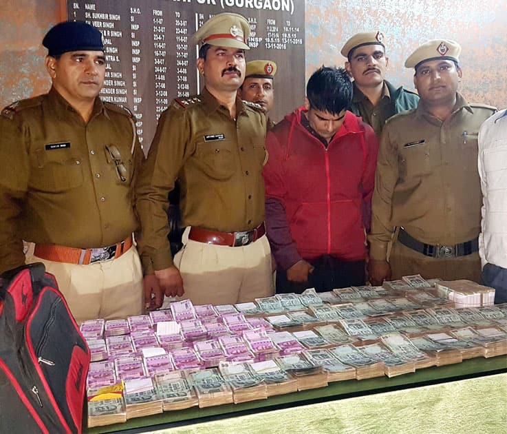 Police arrest businessman with cash